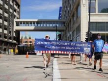 Members of Democrats for Life of America rally outside the Democratic National Convention in Milwaukee in August 2020